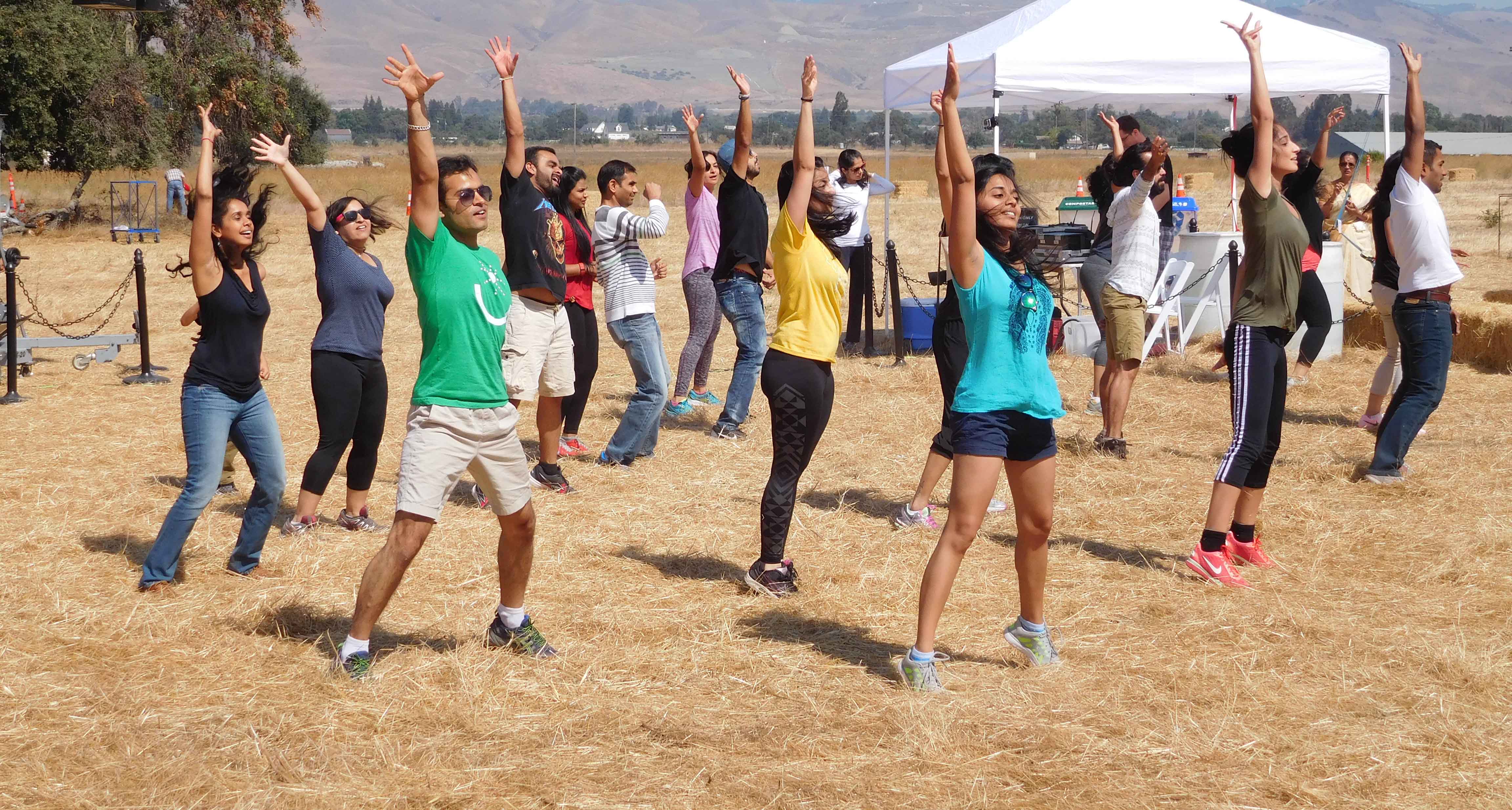 Group of dancers doing choreography at Coyote Valley Family Harvest Feast 