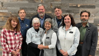OSA Board of Directors stands with outgoing Director Garnetta Annable