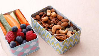 Tins that contain fruit and trail mix