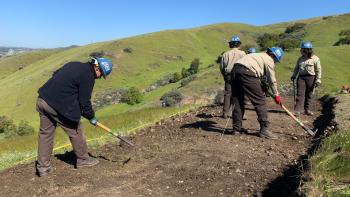 OSA Staff members work on building a trail at MOCR