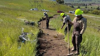 OSA Staff members work on building a trail at MOCR