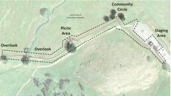 An aerial view of the project shows a staging area, community circle, picnic area and two overlooks.