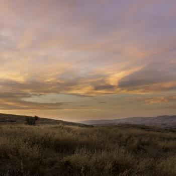 A cloudy sky over the Santa Teresa Foothills