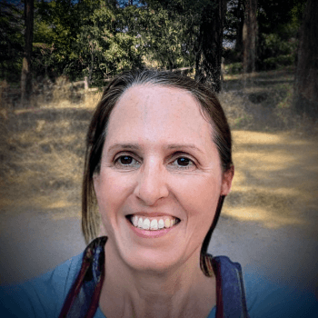 a selfie of Beth Fryksdale on a trail