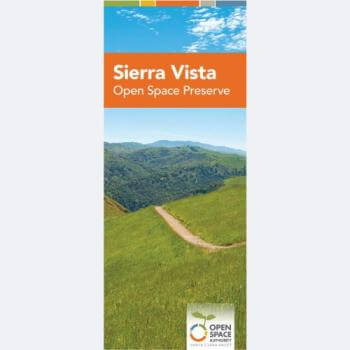 The cover of a brochure with the title Sierra Vista Open Space Preserve in an orange banner over a landscape photo of a trail winding across a green hillside